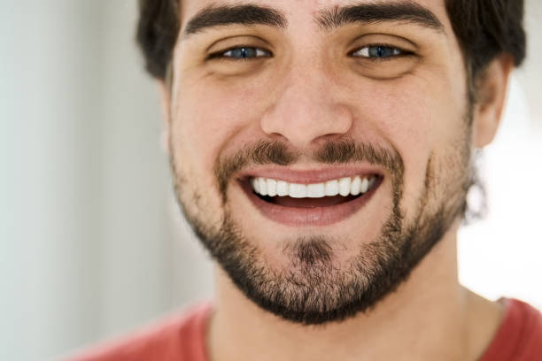 Smiling patient after dental implant treatment