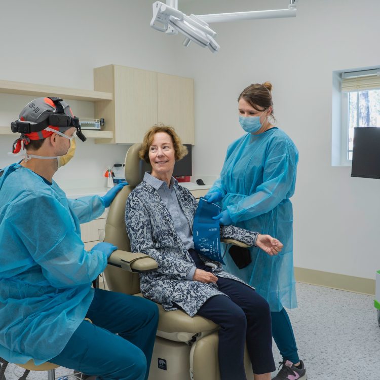 A smiling adult patient or non-graphic dental implant consultation image.