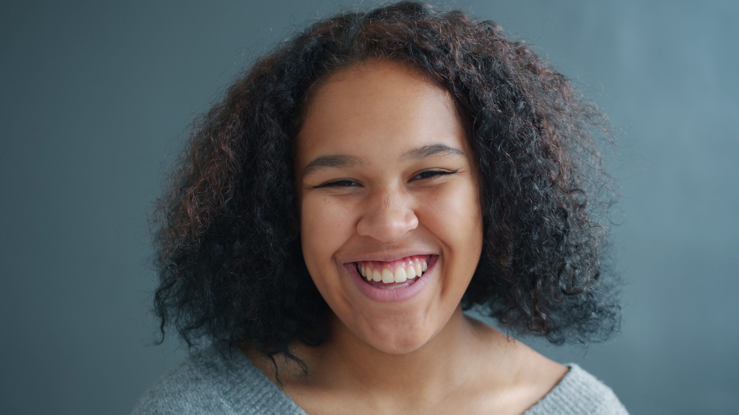 Smiling patient with dentures and partials